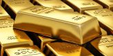 Cena zlata klesla nejníže za téměř sedm měsíců, blíží se k 1800 USD za unci
