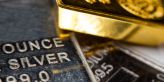 Zlato posouvá rekordy, pomáhá slabý dolar a podpora ekonomice