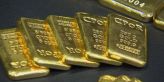 Cena zlata je na více než ročním minimu, čeká se na pohyb úroků v eurozóně