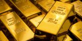 Panika na trzích způsobená bankovní krizí vystřelila cenu zlata. Je nejvýše za poslední rok